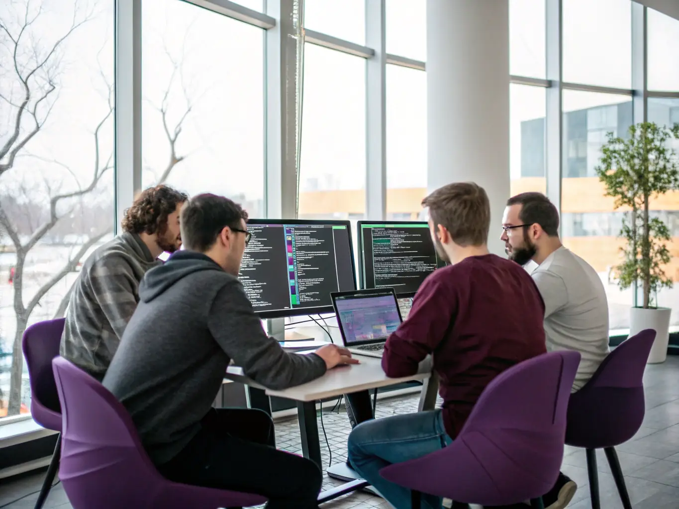 A team of software developers collaborating on a project, showcasing their expertise in creating custom software solutions.
